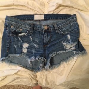 BUCKLE SHORTS—Gilded intent denim shorts